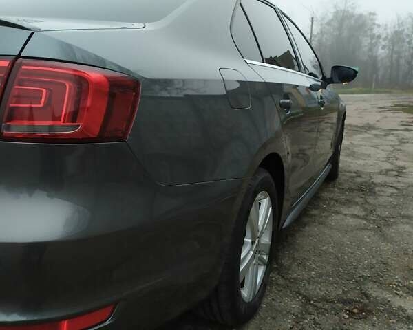 Серый Фольксваген Джетта, объемом двигателя 1.39 л и пробегом 223 тыс. км за 9900 $, фото 3 на Automoto.ua