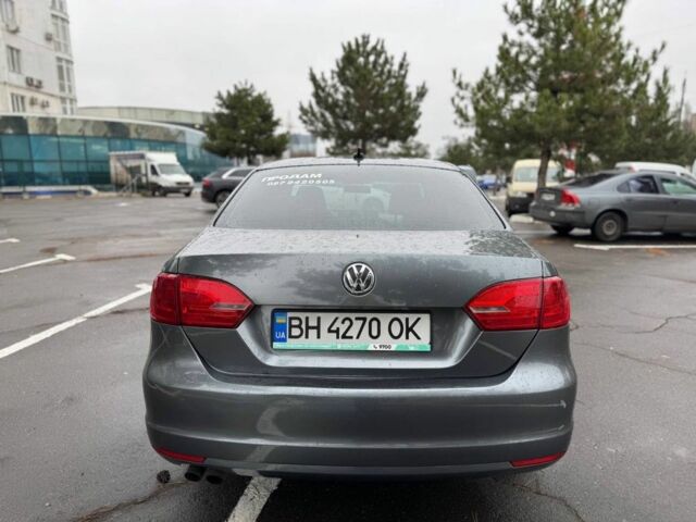 Серый Фольксваген Джетта, объемом двигателя 1.8 л и пробегом 199 тыс. км за 7599 $, фото 6 на Automoto.ua