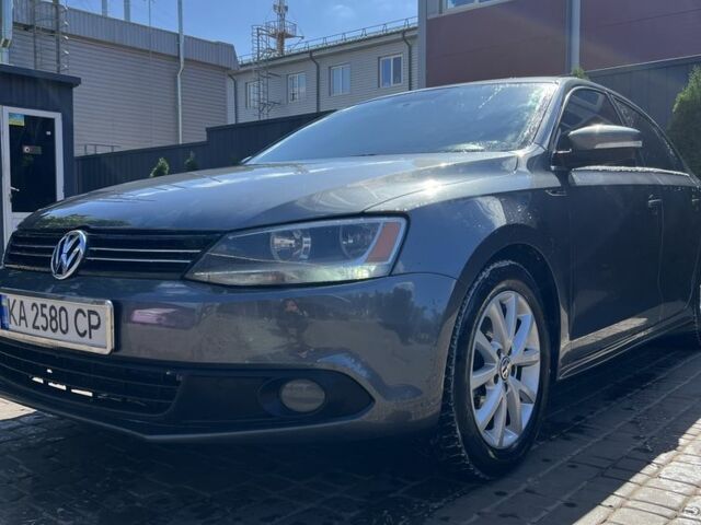 Серый Фольксваген Джетта, объемом двигателя 1.8 л и пробегом 128 тыс. км за 9000 $, фото 6 на Automoto.ua