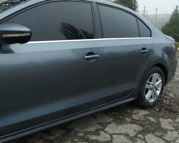 Серый Фольксваген Джетта, объемом двигателя 1.39 л и пробегом 223 тыс. км за 9900 $, фото 8 на Automoto.ua