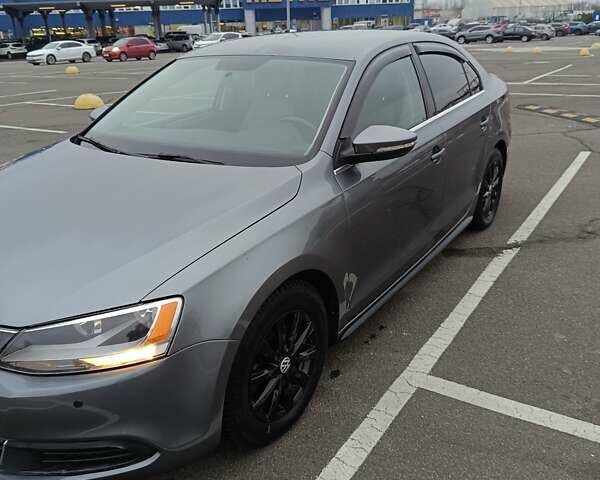 Серый Фольксваген Джетта, объемом двигателя 1.39 л и пробегом 128 тыс. км за 9500 $, фото 2 на Automoto.ua