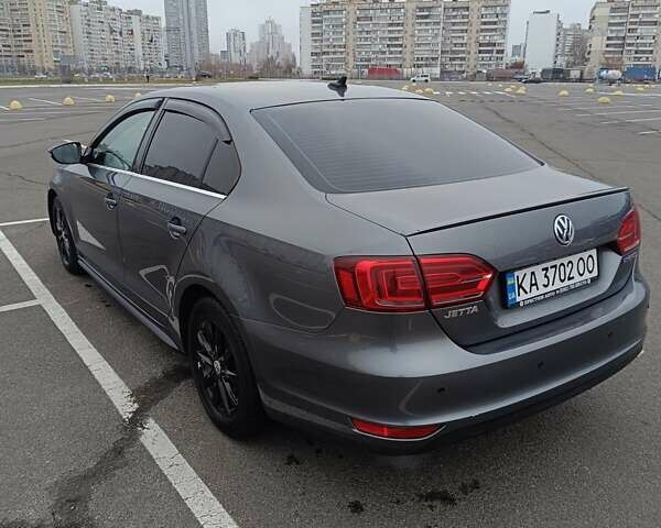 Серый Фольксваген Джетта, объемом двигателя 1.39 л и пробегом 128 тыс. км за 9500 $, фото 6 на Automoto.ua