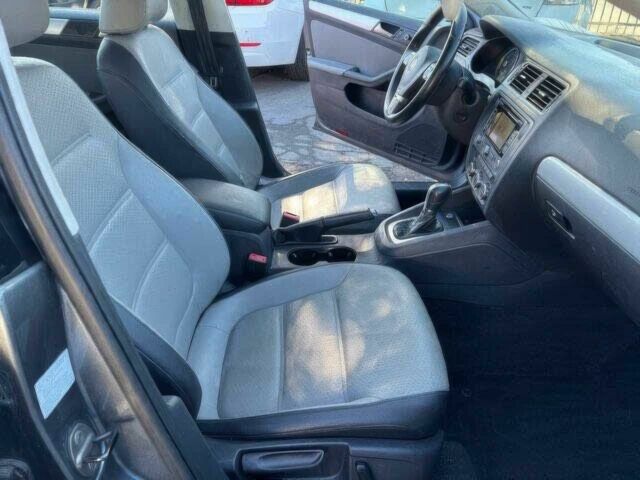 Фольксваген Джетта 2013 у Житомирі на Automoto.ua Сірий Фольксваген Джетта, об'ємом двигуна 1.4 л та пробігом 80 тис. км за 1900 $, фото 4 на Automoto.ua