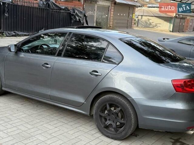Сірий Фольксваген Джетта, об'ємом двигуна 2 л та пробігом 219 тис. км за 8000 $, фото 4 на Automoto.ua