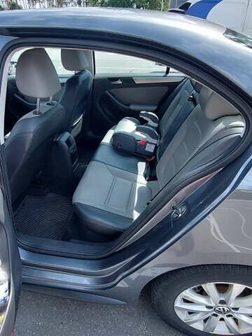 Серый Фольксваген Джетта, объемом двигателя 1.4 л и пробегом 250 тыс. км за 10450 $, фото 7 на Automoto.ua