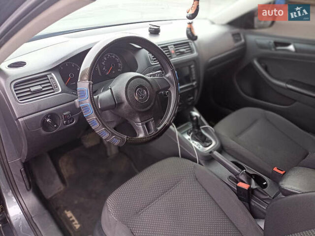 Серый Фольксваген Джетта, объемом двигателя 2 л и пробегом 107 тыс. км за 7500 $, фото 17 на Automoto.ua