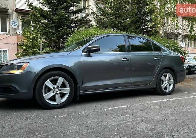 Сірий Фольксваген Джетта, об'ємом двигуна 1.97 л та пробігом 130 тис. км за 11499 $, фото 2 на Automoto.ua