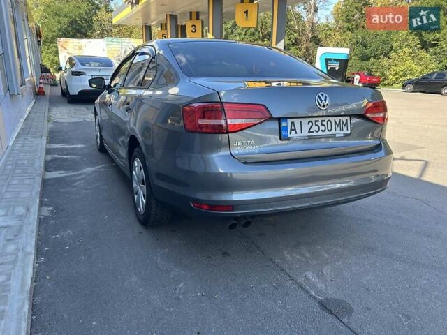 Сірий Фольксваген Джетта, об'ємом двигуна 2 л та пробігом 175 тис. км за 8900 $, фото 7 на Automoto.ua