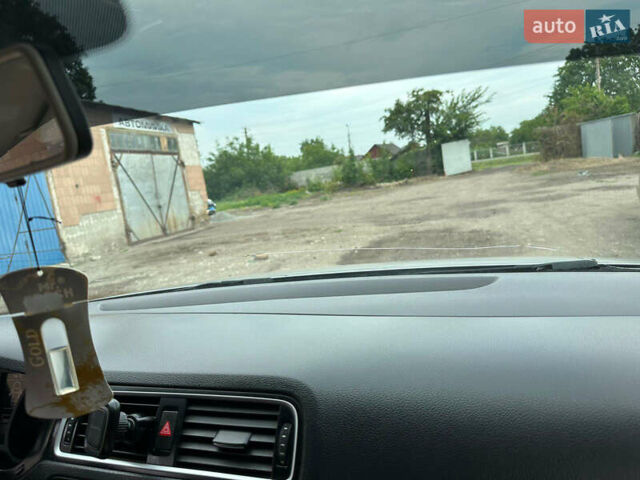 Фольксваген Джетта 2014 в Сахновщине на Automoto.ua Серый Фольксваген Джетта, объемом двигателя 1.8 л и пробегом 230 тыс. км за 8200 $, фото 12 на Automoto.ua