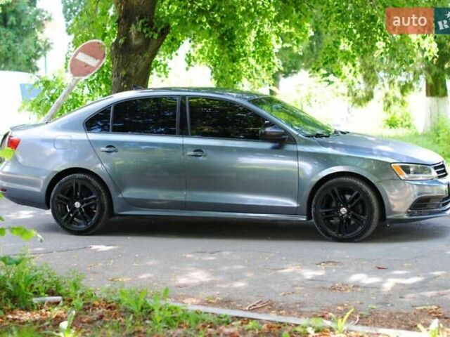 Серый Фольксваген Джетта, объемом двигателя 1.8 л и пробегом 311 тыс. км за 9500 $, фото 1 на Automoto.ua