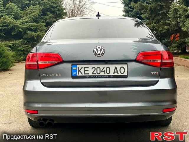 Серый Фольксваген Джетта, объемом двигателя 1.8 л и пробегом 119 тыс. км за 10000 $, фото 5 на Automoto.ua