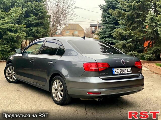 Серый Фольксваген Джетта, объемом двигателя 1.8 л и пробегом 119 тыс. км за 10000 $, фото 2 на Automoto.ua