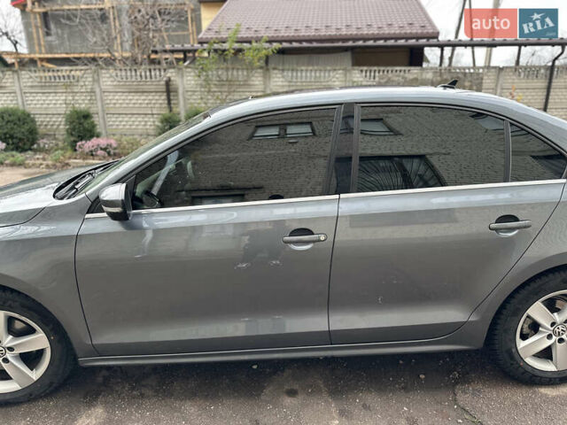 Серый Фольксваген Джетта, объемом двигателя 1.97 л и пробегом 260 тыс. км за 11000 $, фото 2 на Automoto.ua