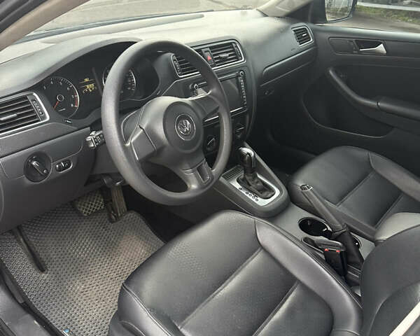 Сірий Фольксваген Джетта, об'ємом двигуна 1.8 л та пробігом 186 тис. км за 8600 $, фото 7 на Automoto.ua