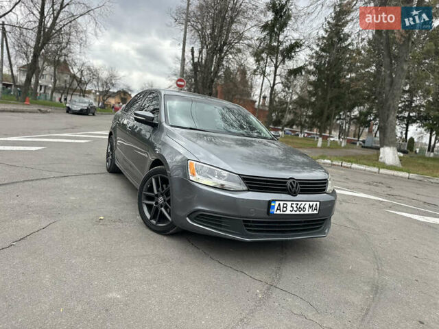 Серый Фольксваген Джетта, объемом двигателя 1.8 л и пробегом 228 тыс. км за 6999 $, фото 1 на Automoto.ua