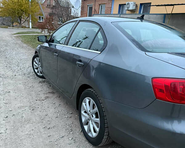 Серый Фольксваген Джетта, объемом двигателя 1.8 л и пробегом 197 тыс. км за 8000 $, фото 3 на Automoto.ua