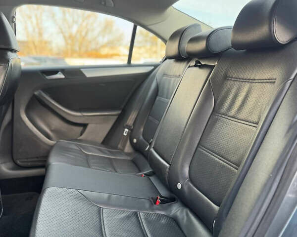 Серый Фольксваген Джетта, объемом двигателя 1.8 л и пробегом 166 тыс. км за 7700 $, фото 7 на Automoto.ua