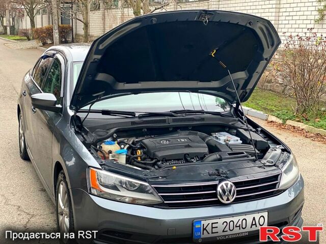 Серый Фольксваген Джетта, объемом двигателя 1.8 л и пробегом 119 тыс. км за 10000 $, фото 8 на Automoto.ua