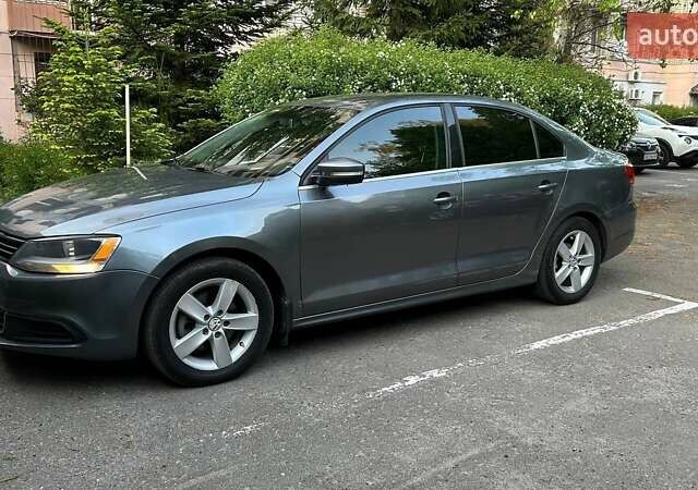 Сірий Фольксваген Джетта, об'ємом двигуна 1.97 л та пробігом 130 тис. км за 11499 $, фото 1 на Automoto.ua