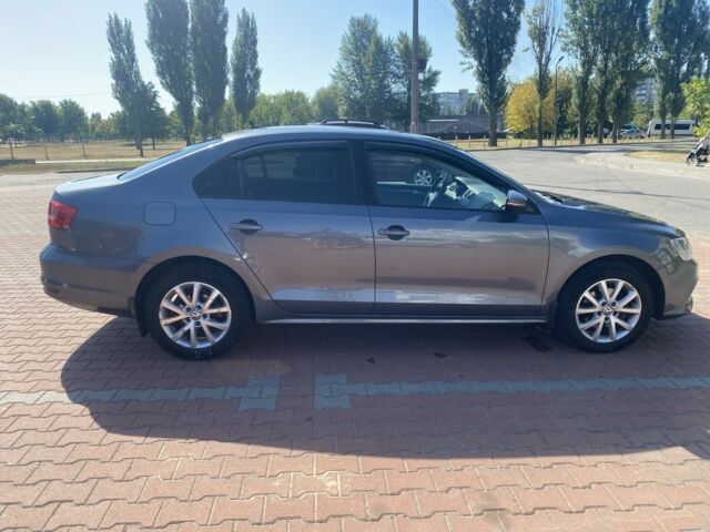 Серый Фольксваген Джетта, объемом двигателя 1.4 л и пробегом 217 тыс. км за 10700 $, фото 8 на Automoto.ua