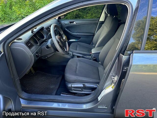 Сірий Фольксваген Джетта, об'ємом двигуна 2 л та пробігом 125 тис. км за 10500 $, фото 3 на Automoto.ua