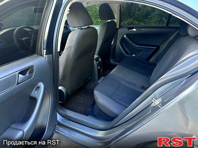 Сірий Фольксваген Джетта, об'ємом двигуна 2 л та пробігом 125 тис. км за 10500 $, фото 4 на Automoto.ua