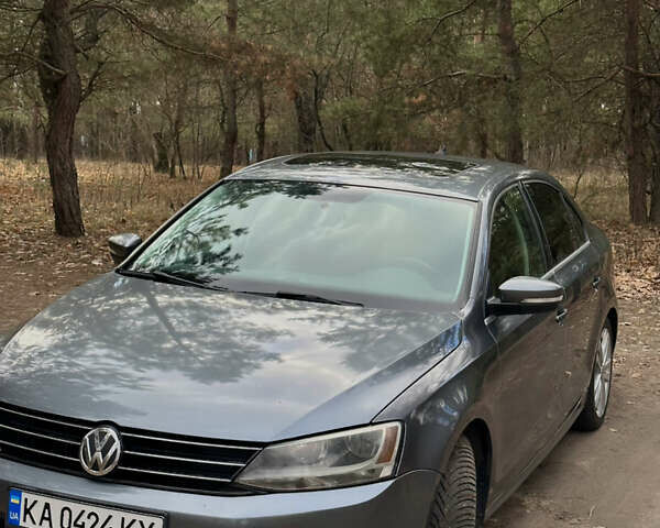 Серый Фольксваген Джетта, объемом двигателя 1.8 л и пробегом 240 тыс. км за 9600 $, фото 1 на Automoto.ua