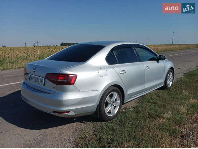 Серый Фольксваген Джетта, объемом двигателя 1.4 л и пробегом 120 тыс. км за 9800 $, фото 5 на Automoto.ua