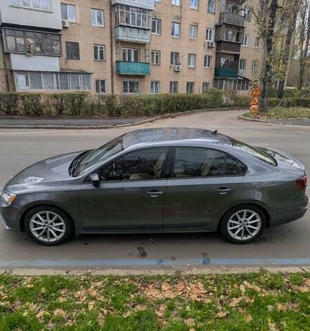 Серый Фольксваген Джетта, объемом двигателя 1.8 л и пробегом 126 тыс. км за 12500 $, фото 1 на Automoto.ua