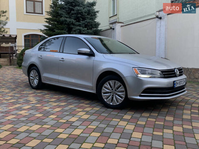 Серый Фольксваген Джетта, объемом двигателя 1.4 л и пробегом 113 тыс. км за 9900 $, фото 1 на Automoto.ua