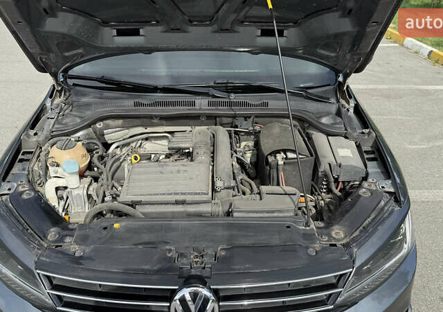 Серый Фольксваген Джетта, объемом двигателя 1.39 л и пробегом 133 тыс. км за 10900 $, фото 19 на Automoto.ua