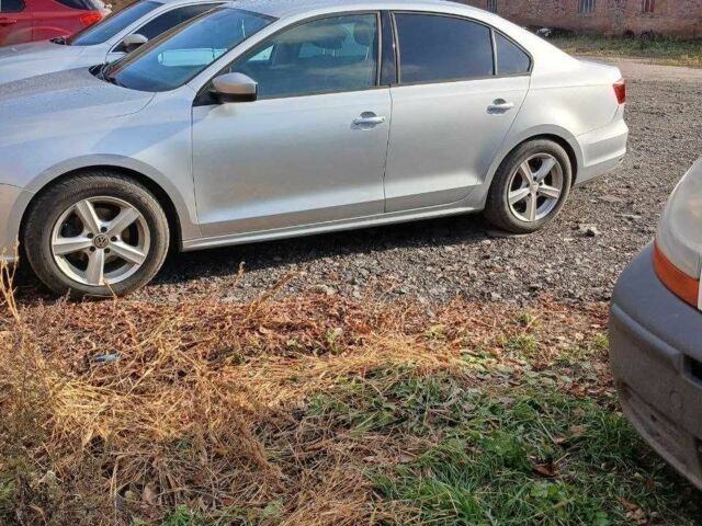 Серый Фольксваген Джетта, объемом двигателя 1.4 л и пробегом 190 тыс. км за 8600 $, фото 5 на Automoto.ua