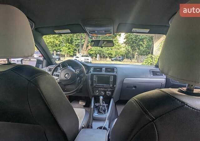 Серый Фольксваген Джетта, объемом двигателя 1.8 л и пробегом 126 тыс. км за 12500 $, фото 5 на Automoto.ua