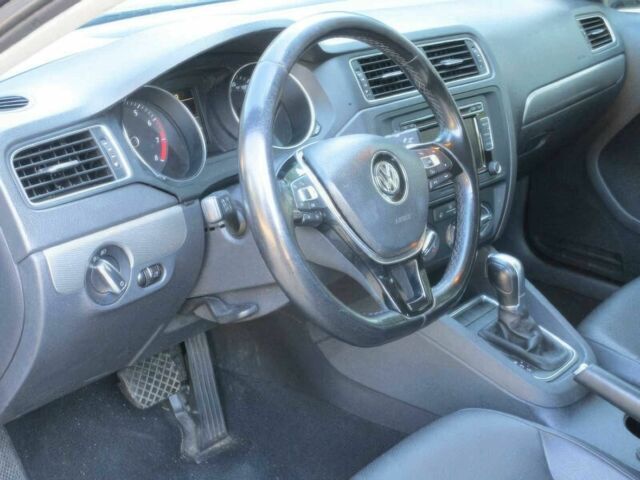 Серый Фольксваген Джетта, объемом двигателя 1.8 л и пробегом 76 тыс. км за 5900 $, фото 7 на Automoto.ua