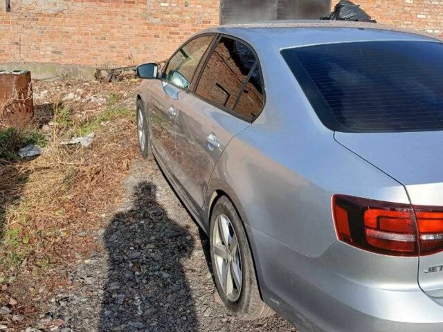 Серый Фольксваген Джетта, объемом двигателя 1.4 л и пробегом 190 тыс. км за 8600 $, фото 4 на Automoto.ua