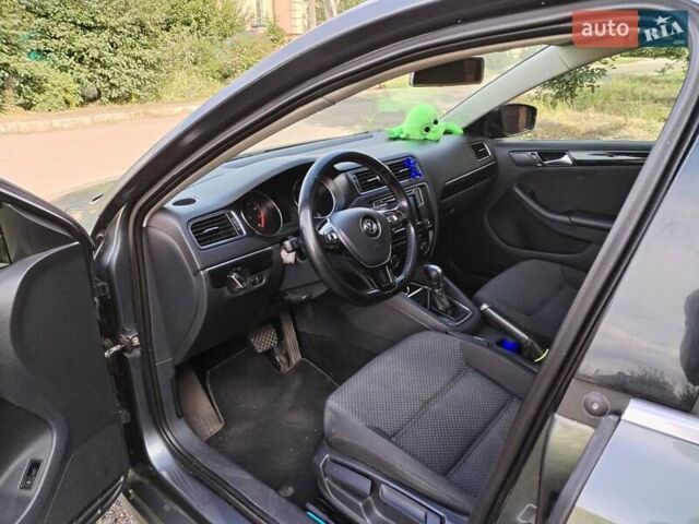 Серый Фольксваген Джетта, объемом двигателя 1.4 л и пробегом 201 тыс. км за 11500 $, фото 6 на Automoto.ua