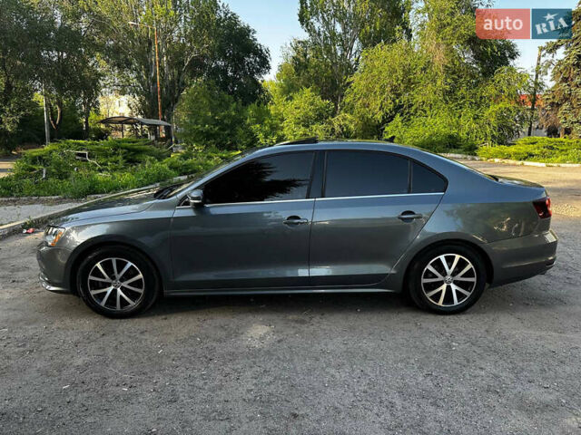 Сірий Фольксваген Джетта, об'ємом двигуна 1.4 л та пробігом 166 тис. км за 11500 $, фото 2 на Automoto.ua