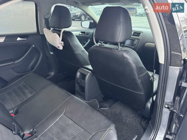 Серый Фольксваген Джетта, объемом двигателя 1.4 л и пробегом 160 тыс. км за 11000 $, фото 6 на Automoto.ua