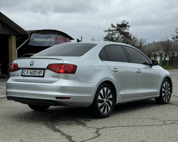 Сірий Фольксваген Джетта, об'ємом двигуна 1.39 л та пробігом 144 тис. км за 11999 $, фото 3 на Automoto.ua