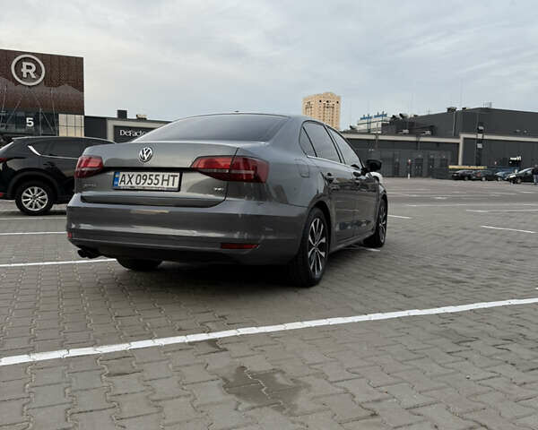 Сірий Фольксваген Джетта, об'ємом двигуна 1.39 л та пробігом 127 тис. км за 11000 $, фото 5 на Automoto.ua
