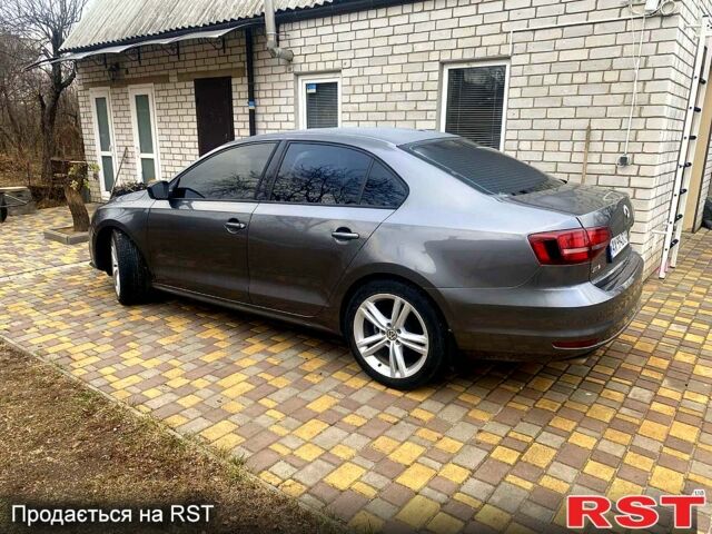 Сірий Фольксваген Джетта, об'ємом двигуна 1.4 л та пробігом 122 тис. км за 9300 $, фото 2 на Automoto.ua