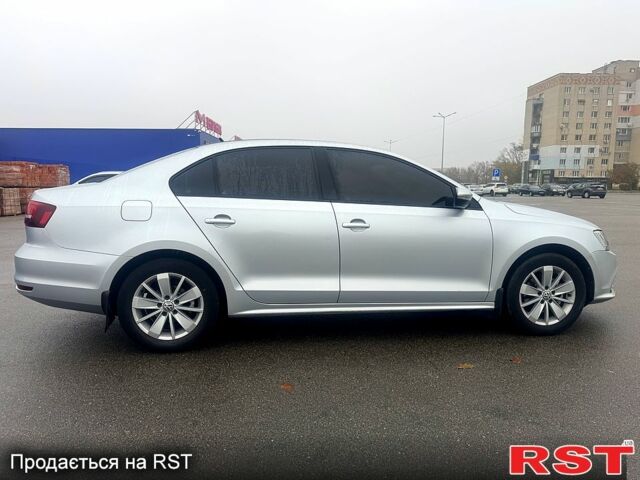 Серый Фольксваген Джетта, объемом двигателя 1.6 л и пробегом 138 тыс. км за 13500 $, фото 4 на Automoto.ua