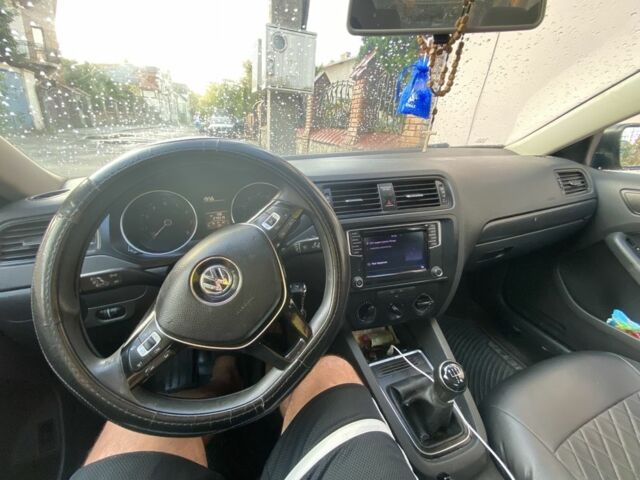 Серый Фольксваген Джетта, объемом двигателя 1.4 л и пробегом 270 тыс. км за 7500 $, фото 6 на Automoto.ua