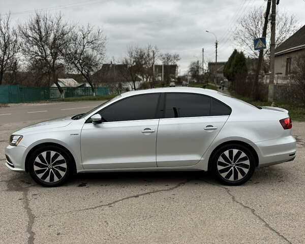 Сірий Фольксваген Джетта, об'ємом двигуна 1.39 л та пробігом 144 тис. км за 11999 $, фото 6 на Automoto.ua