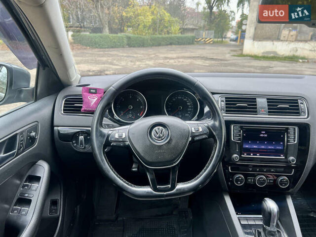 Серый Фольксваген Джетта, объемом двигателя 1.6 л и пробегом 224 тыс. км за 11500 $, фото 4 на Automoto.ua