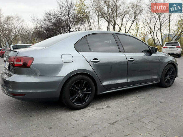Серый Фольксваген Джетта, объемом двигателя 1.8 л и пробегом 237 тыс. км за 10300 $, фото 4 на Automoto.ua