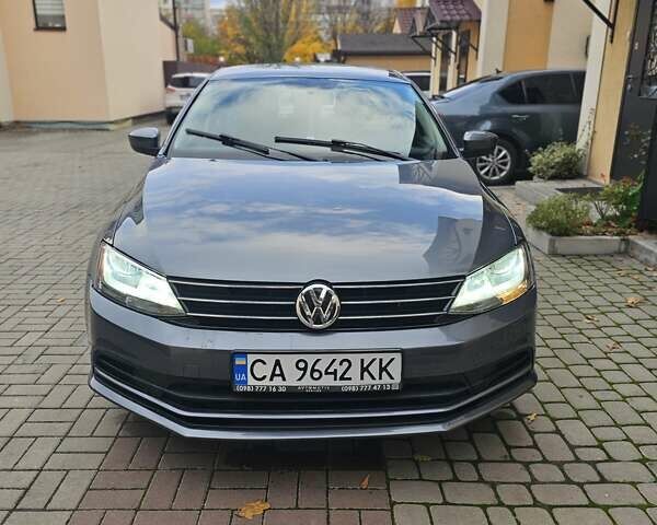 Сірий Фольксваген Джетта, об'ємом двигуна 1.4 л та пробігом 80 тис. км за 10499 $, фото 5 на Automoto.ua