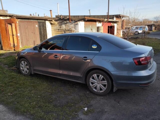 Серый Фольксваген Джетта, объемом двигателя 1.4 л и пробегом 70 тыс. км за 11000 $, фото 1 на Automoto.ua