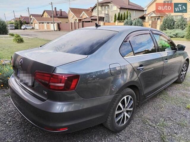 Серый Фольксваген Джетта, объемом двигателя 1.4 л и пробегом 201 тыс. км за 11500 $, фото 3 на Automoto.ua