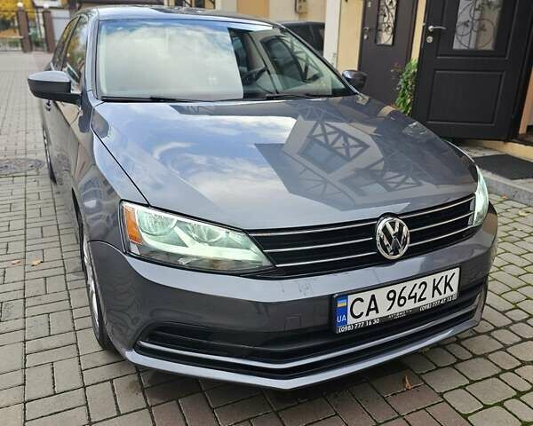 Сірий Фольксваген Джетта, об'ємом двигуна 1.4 л та пробігом 80 тис. км за 10499 $, фото 4 на Automoto.ua